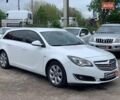 Белый Опель Инсигния, объемом двигателя 2 л и пробегом 241 тыс. км за 9290 $, фото 1 на Automoto.ua