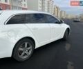 Білий Опель Інсігнія, об'ємом двигуна 2 л та пробігом 316 тис. км за 9000 $, фото 19 на Automoto.ua