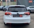 Белый Опель Инсигния, объемом двигателя 2 л и пробегом 241 тыс. км за 9290 $, фото 4 на Automoto.ua