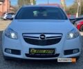 Белый Опель Инсигния, объемом двигателя 2 л и пробегом 292 тыс. км за 9400 $, фото 1 на Automoto.ua