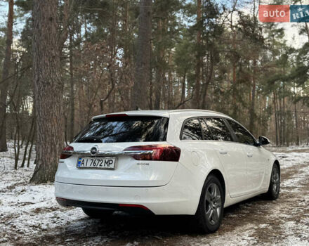 Белый Опель Инсигния, объемом двигателя 2 л и пробегом 317 тыс. км за 8700 $, фото 4 на Automoto.ua
