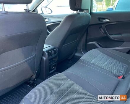 Белый Опель Инсигния, объемом двигателя 2 л и пробегом 292 тыс. км за 9400 $, фото 13 на Automoto.ua