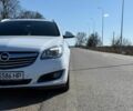 Білий Опель Інсігнія, об'ємом двигуна 2 л та пробігом 270 тис. км за 9000 $, фото 2 на Automoto.ua
