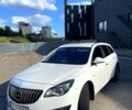 Белый Опель Инсигния, объемом двигателя 2 л и пробегом 246 тыс. км за 9100 $, фото 1 на Automoto.ua
