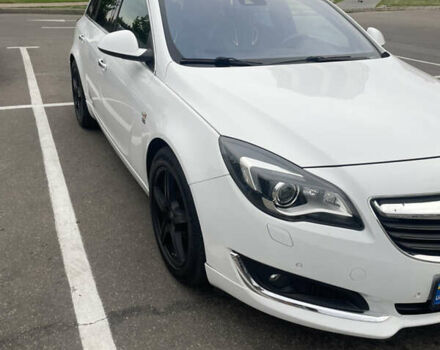 Білий Опель Інсігнія, об'ємом двигуна 2 л та пробігом 200 тис. км за 12500 $, фото 14 на Automoto.ua