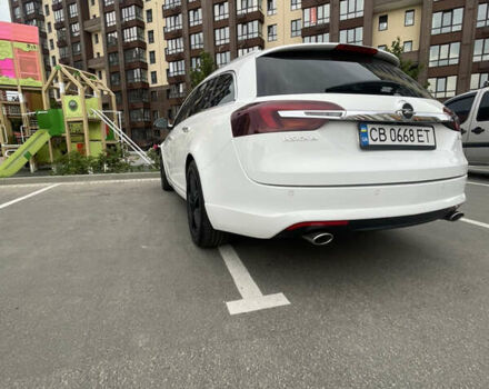 Білий Опель Інсігнія, об'ємом двигуна 2 л та пробігом 200 тис. км за 12500 $, фото 5 на Automoto.ua