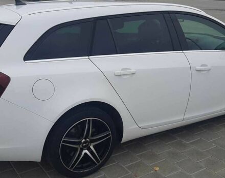 Белый Опель Инсигния, объемом двигателя 2 л и пробегом 220 тыс. км за 8600 $, фото 13 на Automoto.ua