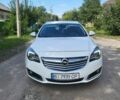 Білий Опель Інсігнія, об'ємом двигуна 2 л та пробігом 250 тис. км за 8850 $, фото 1 на Automoto.ua