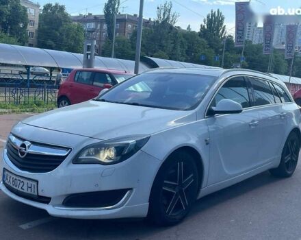 Белый Опель Инсигния, объемом двигателя 2 л и пробегом 297 тыс. км за 10700 $, фото 1 на Automoto.ua
