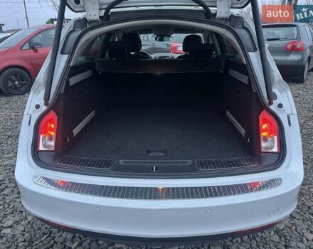 Белый Опель Инсигния, объемом двигателя 2 л и пробегом 288 тыс. км за 8800 $, фото 8 на Automoto.ua