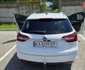 Белый Опель Инсигния, объемом двигателя 2 л и пробегом 280 тыс. км за 10100 $, фото 11 на Automoto.ua