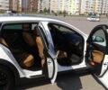 Білий Опель Інсігнія, об'ємом двигуна 1.96 л та пробігом 200 тис. км за 15270 $, фото 5 на Automoto.ua