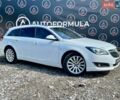 Белый Опель Инсигния, объемом двигателя 2 л и пробегом 250 тыс. км за 11890 $, фото 1 на Automoto.ua