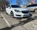 Білий Опель Інсігнія, об'ємом двигуна 2.01 л та пробігом 204 тис. км за 12500 $, фото 1 на Automoto.ua