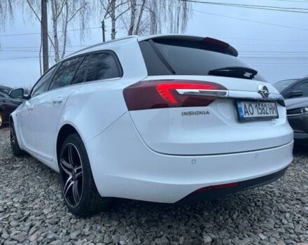 Белый Опель Инсигния, объемом двигателя 2 л и пробегом 217 тыс. км за 8800 $, фото 3 на Automoto.ua