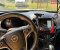 Білий Опель Інсігнія, об'ємом двигуна 1.96 л та пробігом 232 тис. км за 12100 $, фото 4 на Automoto.ua