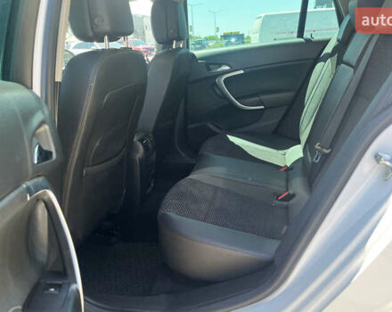 Білий Опель Інсігнія, об'ємом двигуна 2 л та пробігом 334 тис. км за 9150 $, фото 29 на Automoto.ua