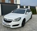 Білий Опель Інсігнія, об'ємом двигуна 1.96 л та пробігом 299 тис. км за 9200 $, фото 4 на Automoto.ua