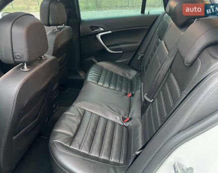 Білий Опель Інсігнія, об'ємом двигуна 1.96 л та пробігом 298 тис. км за 10800 $, фото 25 на Automoto.ua