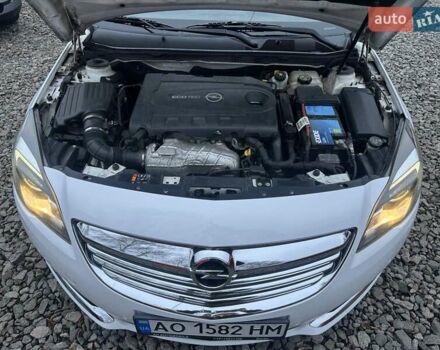 Белый Опель Инсигния, объемом двигателя 2 л и пробегом 288 тыс. км за 8800 $, фото 7 на Automoto.ua