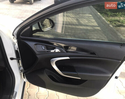 Білий Опель Інсігнія, об'ємом двигуна 2 л та пробігом 210 тис. км за 10800 $, фото 28 на Automoto.ua