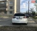Белый Опель Инсигния, объемом двигателя 1.96 л и пробегом 214 тыс. км за 9850 $, фото 2 на Automoto.ua