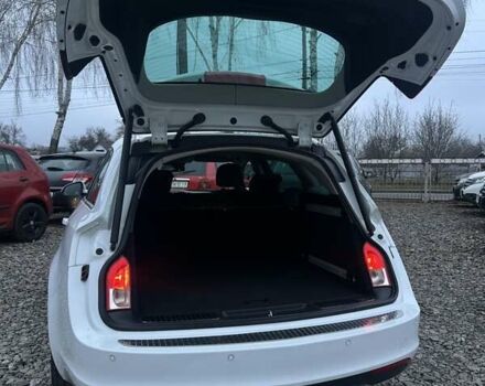 Белый Опель Инсигния, объемом двигателя 2 л и пробегом 288 тыс. км за 8800 $, фото 9 на Automoto.ua