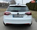 Білий Опель Інсігнія, об'ємом двигуна 1.96 л та пробігом 204 тис. км за 9500 $, фото 7 на Automoto.ua