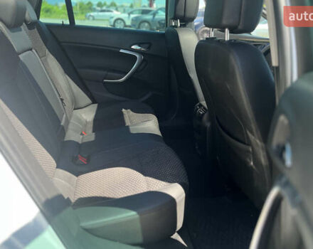 Білий Опель Інсігнія, об'ємом двигуна 2 л та пробігом 334 тис. км за 9150 $, фото 24 на Automoto.ua