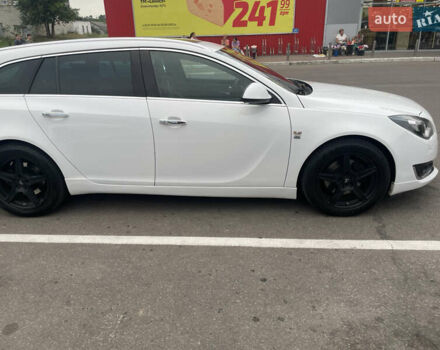 Білий Опель Інсігнія, об'ємом двигуна 2 л та пробігом 200 тис. км за 12500 $, фото 36 на Automoto.ua