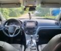 Білий Опель Інсігнія, об'ємом двигуна 2 л та пробігом 250 тис. км за 8850 $, фото 5 на Automoto.ua