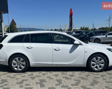 Білий Опель Інсігнія, об'ємом двигуна 2 л та пробігом 334 тис. км за 9150 $, фото 1 на Automoto.ua