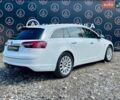 Белый Опель Инсигния, объемом двигателя 2 л и пробегом 250 тыс. км за 11890 $, фото 9 на Automoto.ua
