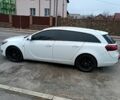 Белый Опель Инсигния, объемом двигателя 2 л и пробегом 175 тыс. км за 9700 $, фото 1 на Automoto.ua