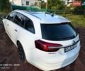 Білий Опель Інсігнія, об'ємом двигуна 1.96 л та пробігом 241 тис. км за 9900 $, фото 6 на Automoto.ua