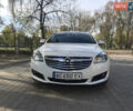 Білий Опель Інсігнія, об'ємом двигуна 2 л та пробігом 210 тис. км за 10800 $, фото 1 на Automoto.ua