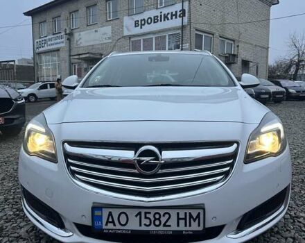 Белый Опель Инсигния, объемом двигателя 2 л и пробегом 288 тыс. км за 8800 $, фото 2 на Automoto.ua
