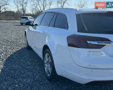 Білий Опель Інсігнія, об'ємом двигуна 1.96 л та пробігом 278 тис. км за 10000 $, фото 27 на Automoto.ua