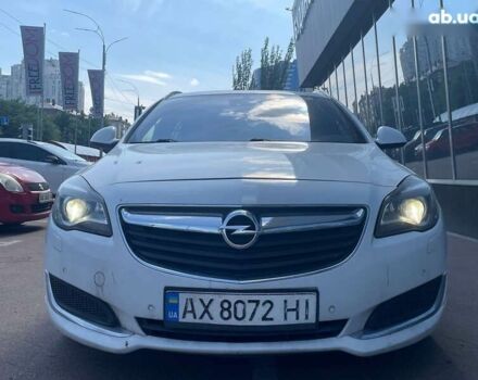 Белый Опель Инсигния, объемом двигателя 2 л и пробегом 297 тыс. км за 10700 $, фото 2 на Automoto.ua