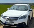Белый Опель Инсигния, объемом двигателя 2 л и пробегом 244 тыс. км за 8900 $, фото 1 на Automoto.ua