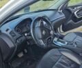 Білий Опель Інсігнія, об'ємом двигуна 1.96 л та пробігом 226 тис. км за 9300 $, фото 9 на Automoto.ua