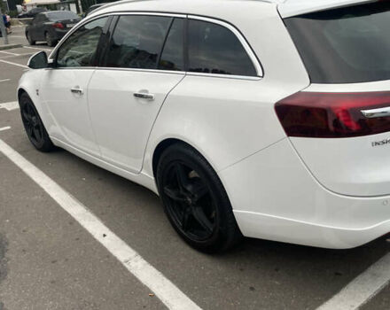 Білий Опель Інсігнія, об'ємом двигуна 2 л та пробігом 200 тис. км за 12500 $, фото 24 на Automoto.ua