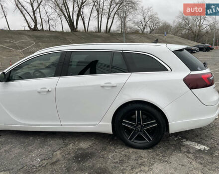 Білий Опель Інсігнія, об'ємом двигуна 1.96 л та пробігом 298 тис. км за 10800 $, фото 5 на Automoto.ua