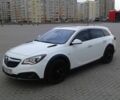 Білий Опель Інсігнія, об'ємом двигуна 1.96 л та пробігом 200 тис. км за 15270 $, фото 4 на Automoto.ua