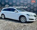Белый Опель Инсигния, объемом двигателя 2 л и пробегом 250 тыс. км за 12390 $, фото 1 на Automoto.ua