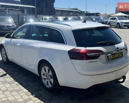 Білий Опель Інсігнія, об'ємом двигуна 2 л та пробігом 334 тис. км за 9150 $, фото 4 на Automoto.ua