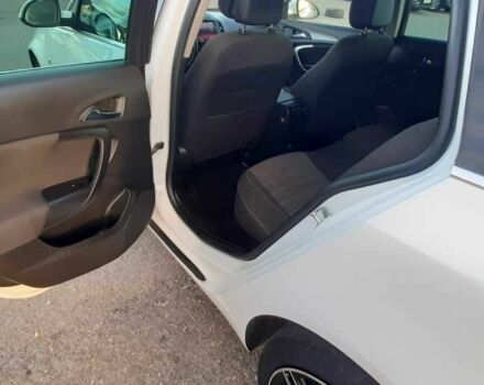 Белый Опель Инсигния, объемом двигателя 2 л и пробегом 220 тыс. км за 8600 $, фото 4 на Automoto.ua