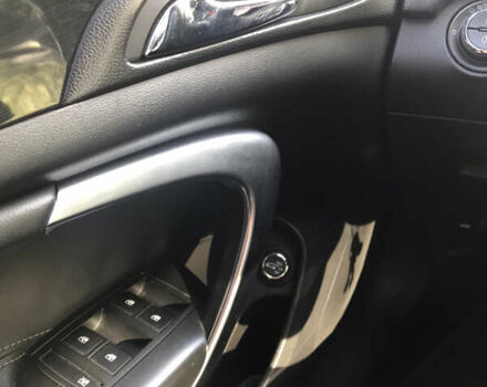 Білий Опель Інсігнія, об'ємом двигуна 2 л та пробігом 210 тис. км за 10800 $, фото 12 на Automoto.ua
