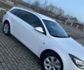 Білий Опель Інсігнія, об'ємом двигуна 1.96 л та пробігом 205 тис. км за 11500 $, фото 2 на Automoto.ua