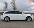 Білий Опель Інсігнія, об'ємом двигуна 1.96 л та пробігом 248 тис. км за 9200 $, фото 4 на Automoto.ua